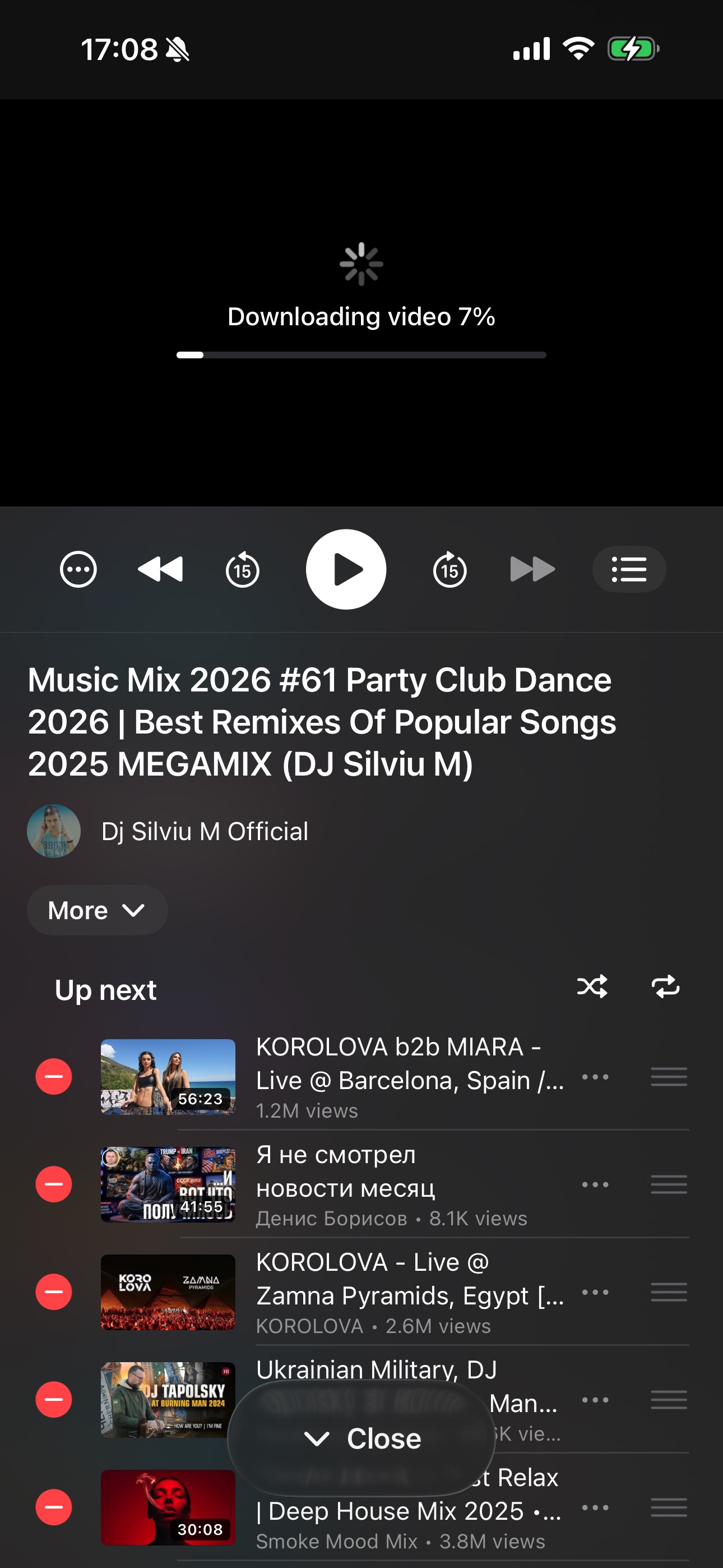Player showing yt-dlp download progress at 7%